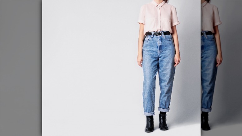 Model wearing '90s "Mom" jeans