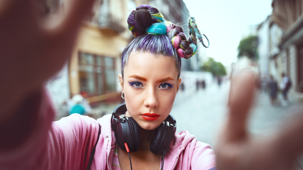 A woman with colorful hair