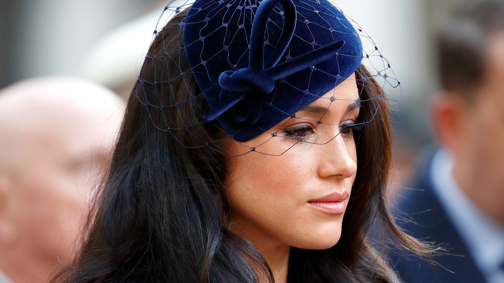 Meghan Markle looking down