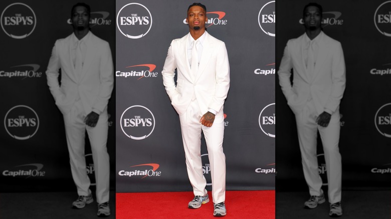 Damar Hamlin in a full white suit on the red carpet at the 2026 ESPYs