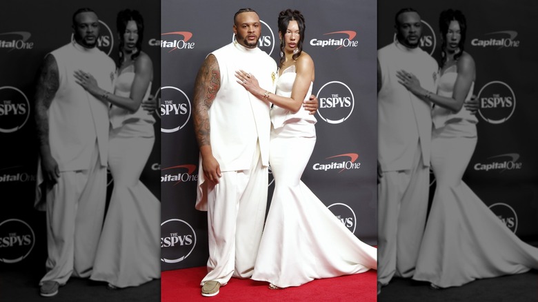 Dion Dawkins with his arm around Daiyaana Muhammad on the 2026 ESPYS red carpet