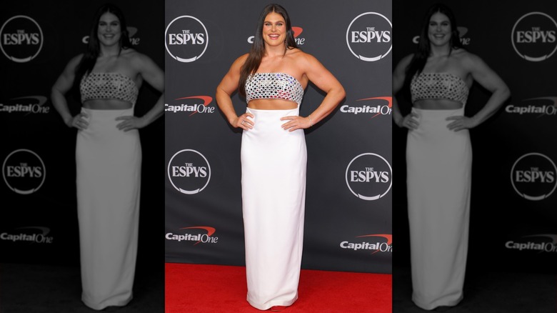 Ilona Maher with her hands on her hips in a silver and white outfit on the ESPYS red carpet in 2026