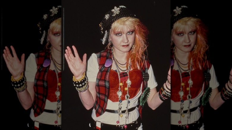 Cyndi Lauper attending the 1985 Grammy Awards, wearing an colorful, overaccessorized pirate look.