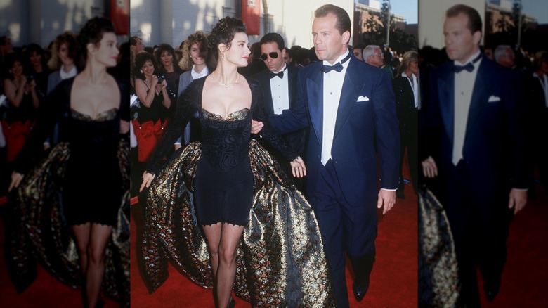Demi Moore (with Bruce Willis) attending the 61st Academy Awards in a black ensemble with a gold shawl.