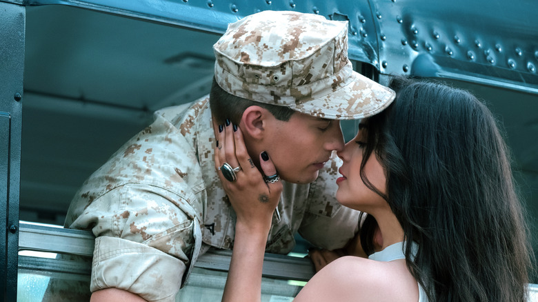 Nicholas Galitzine as Luke and Sofia Carson as Cassie in Purple Hearts
