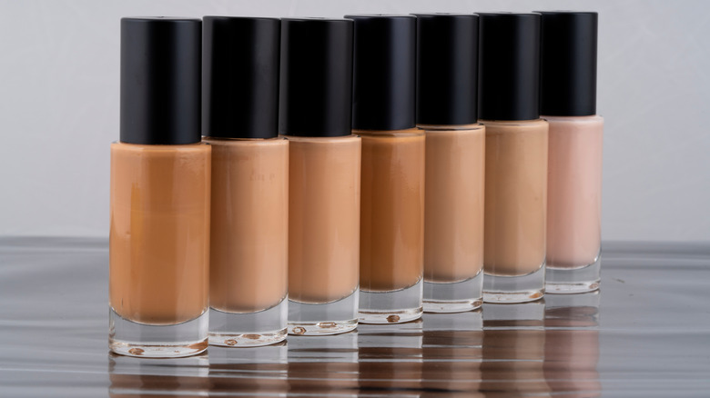 bottles of concealers lined up 