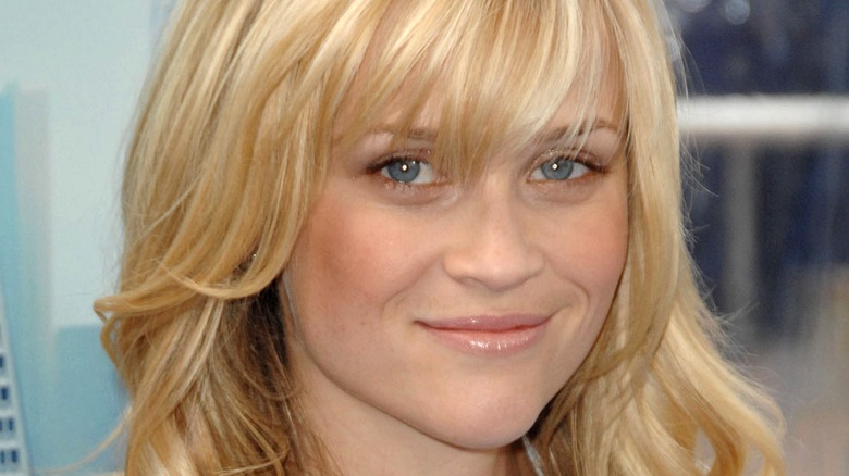 Reese Witherspoon smiling with bangs 