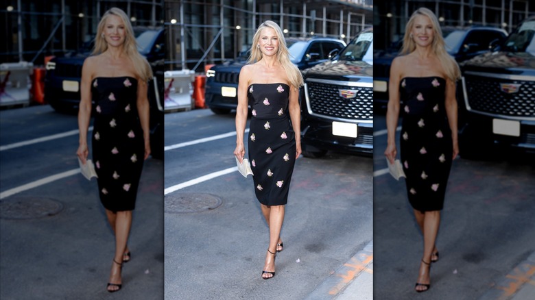 Ali Larter in Manhattan wearing a black dress with floral appliqués