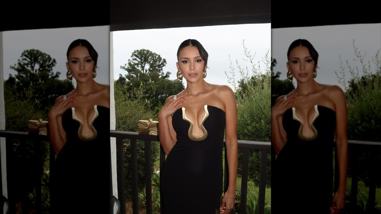 Nina Dobrev posing for a photo