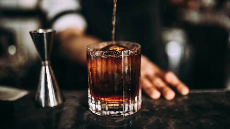 bartender making old fashioned