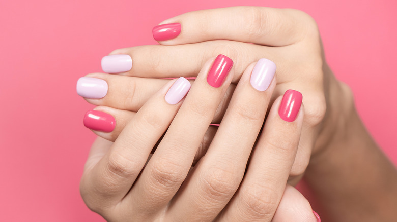 Hands with pink manicure