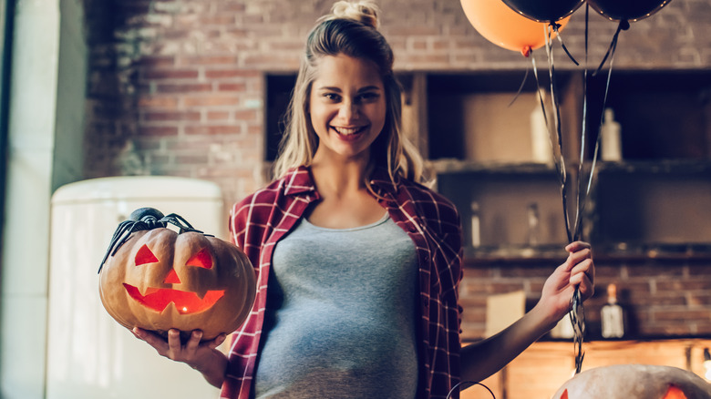 Pregnant woman celebrating Halloween