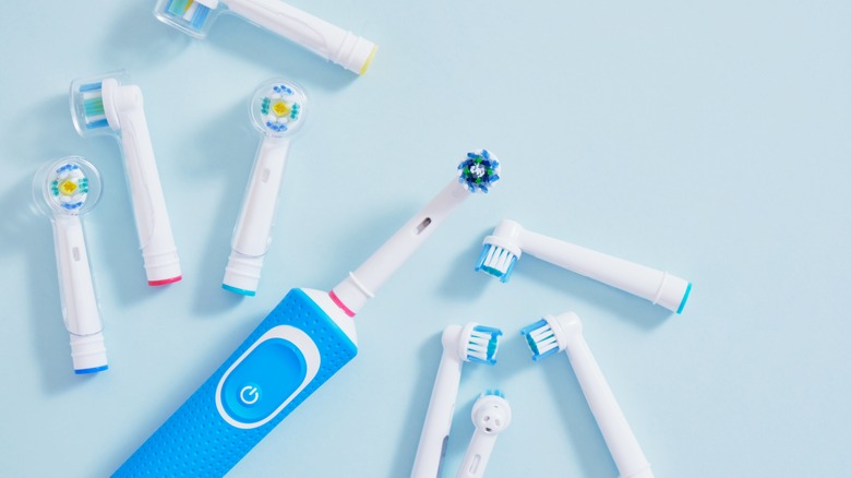Electric toothbrushes with replacement heads