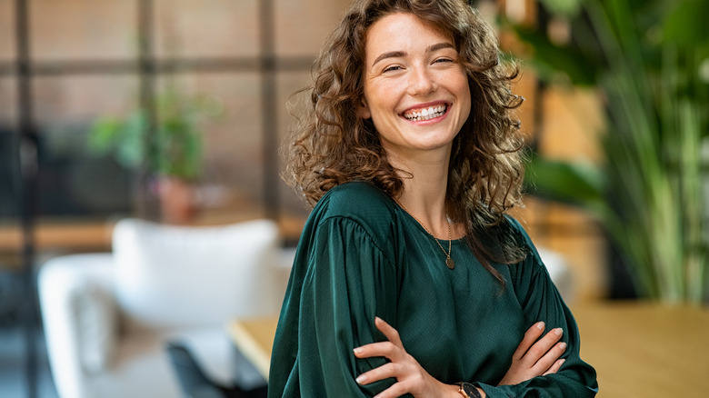 Career woman smiling, looking confident