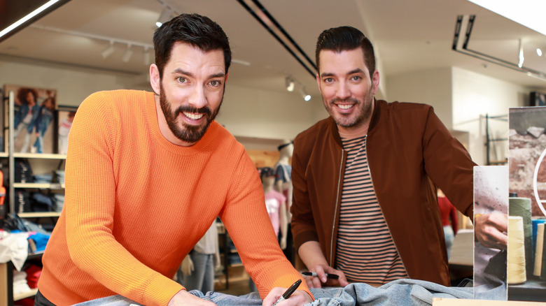 Drew and Jonathan Scott smiling