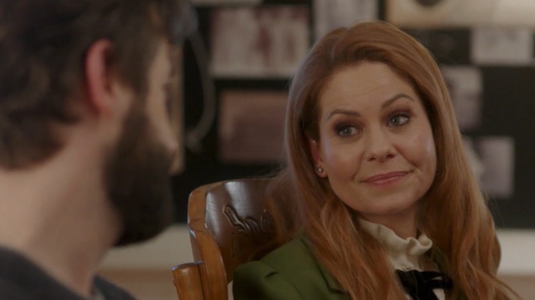A photo showing the lead actor of "Aurora Teagarden Mysteries: Haunted by Murder" Candace Cameron Bure