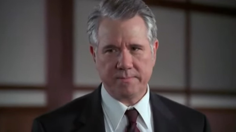 A photo of John Larroquette on the cover of "McBride: The Chameleon Murder"