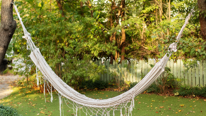 White hammock hanging on trees