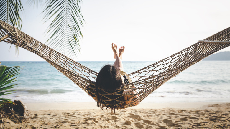 woman in a hammock on the beach
