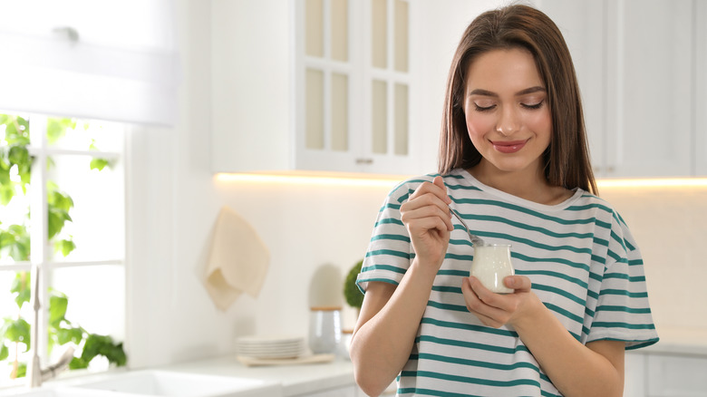 Young woman eating a healthy snack