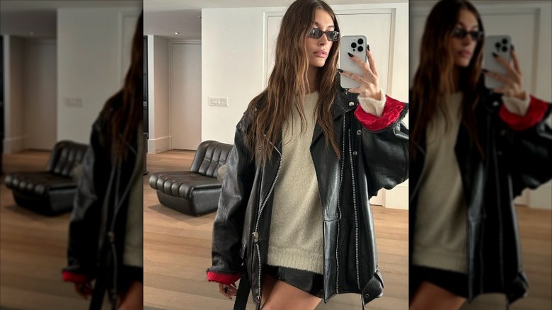 Hailey Bieber mirror selfie in leather outfit