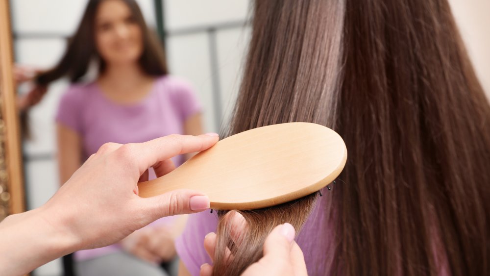 brushing hair