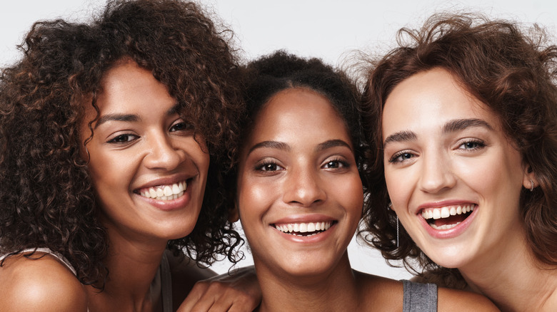 Several women with brown or black hair