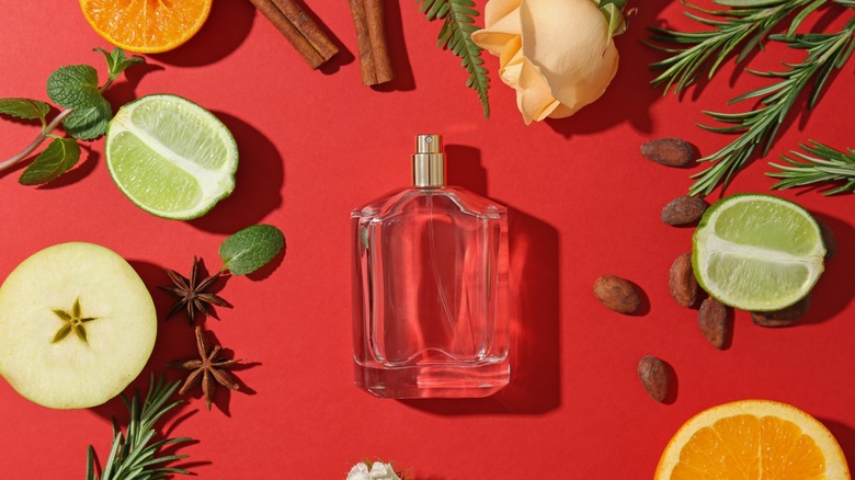 Perfume bottle surrounded by food