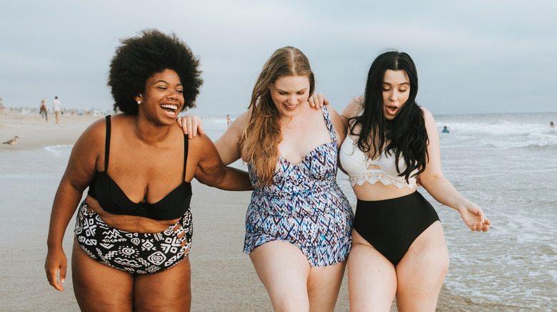 women wearing plus-size swimsuits