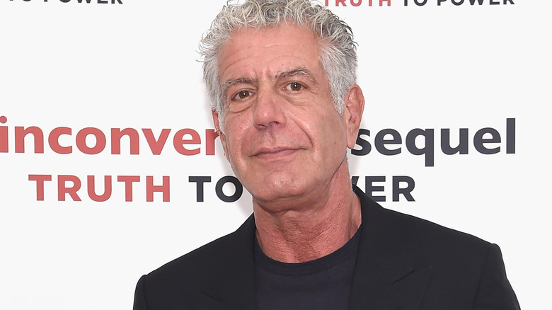 Anthony Bourdain walking a New York City red carpet