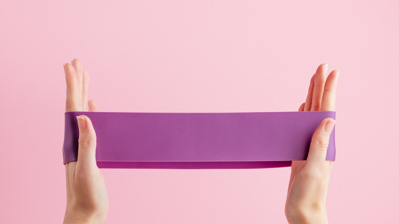 Woman holding a resistance band