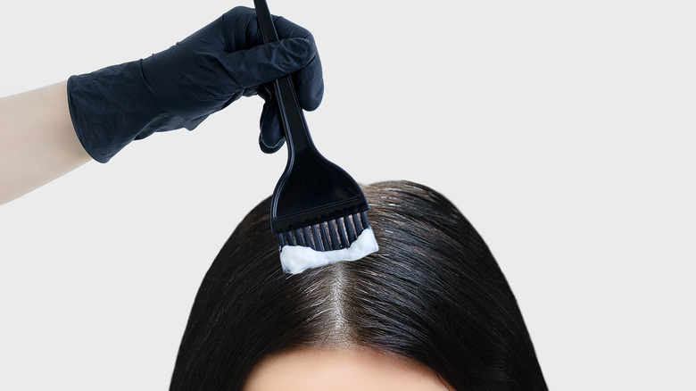 Dark haired woman dying hair
