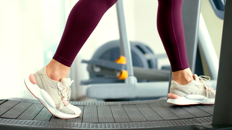 woman walking on treadmill