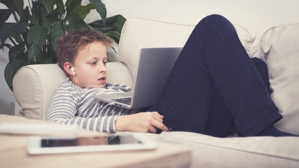 boy watching laptop