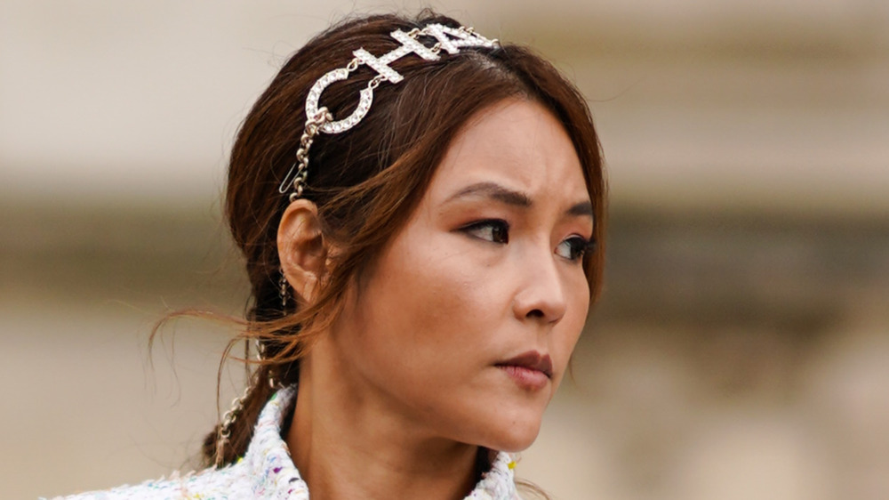 woman wearing Chanel headband