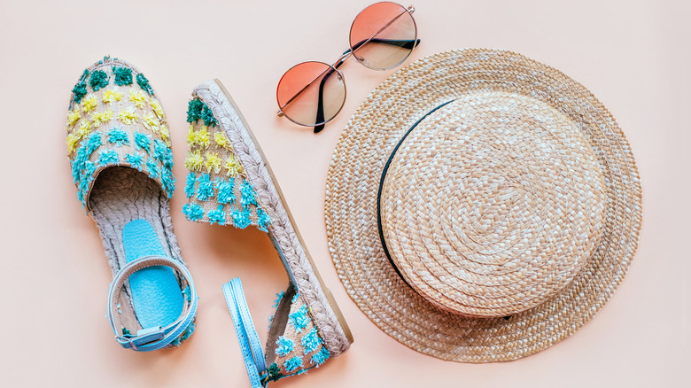 espadrille sandals, sunglasses, and a summer hat