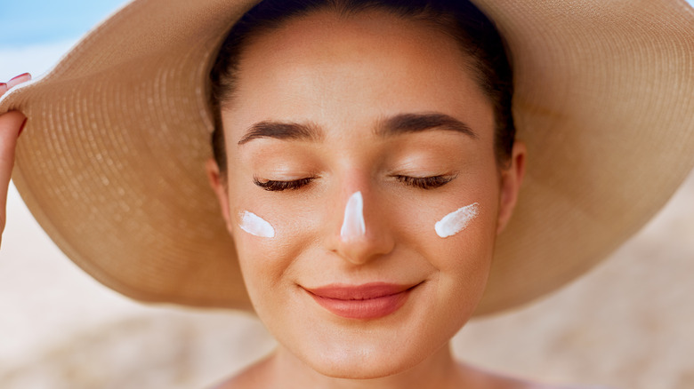 Wearing sunscreen with a hat