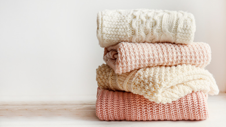 Pink and cream knit sweaters