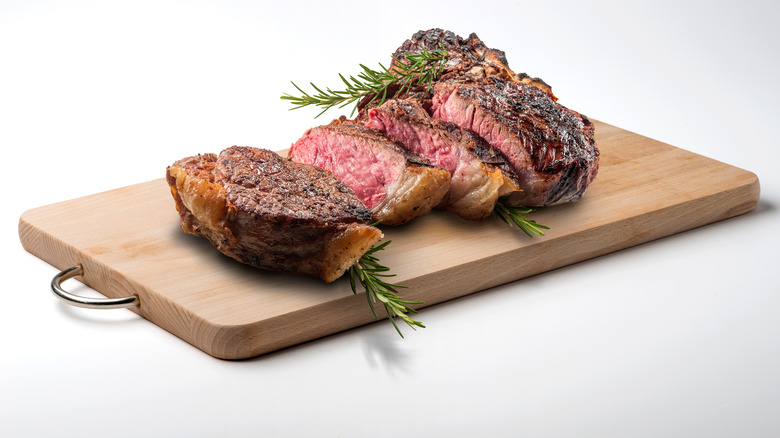 Grilled steak on a wooden board