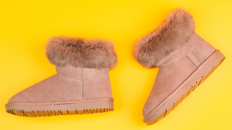 ugg boots on yellow background