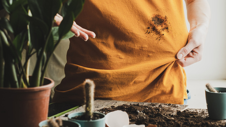 Mud stain on t-shirt