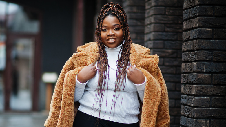 woman wearing faux fur coat