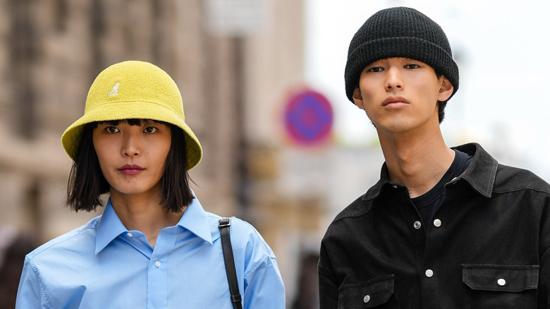 Couple wearing beanie and wool hats