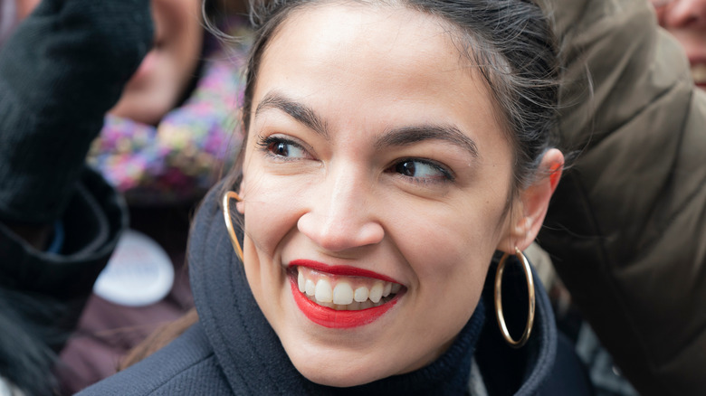 Alexandria Ocasio-Cortez in hoop earrings