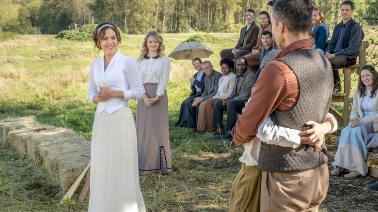 Erin Krakow and others watching two people hug