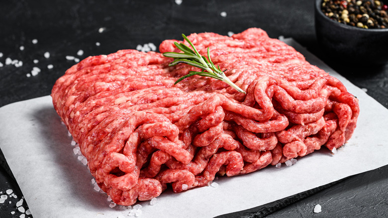 Ground beef sitting on a serving board