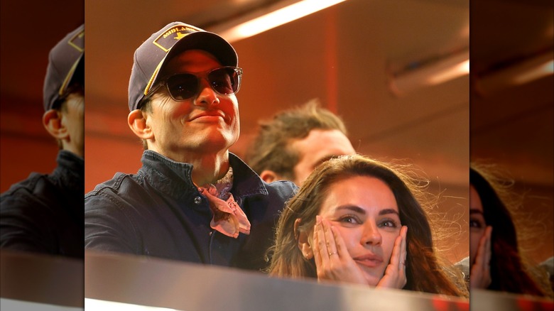 Ashton Kutcher and Mila Kunis in the crowds