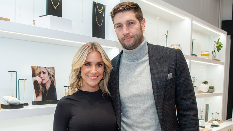 Kristin Cavallari and Jay Cutler wearing black