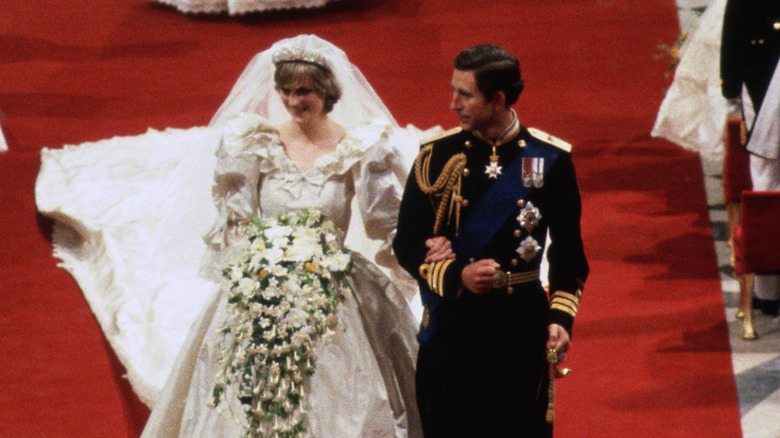 Princess Diana and Prince Charles walking down the aisle on wedding day