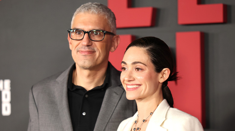 Emmy Rossum and Sam Esmail smiling